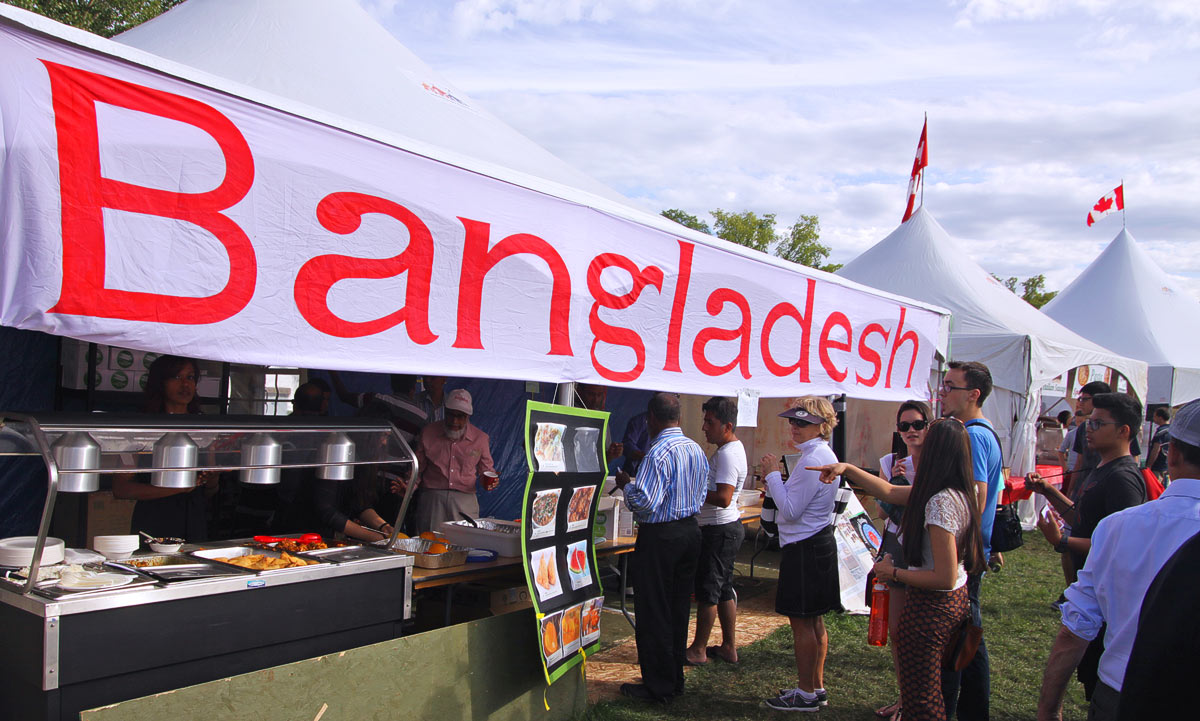 Visitors taste ethnic foods from Bangladesh at the Heritage Festival in Edmonton Visitors taste ethnic foods from Bangladesh at the Heritage Festival in Edmonton